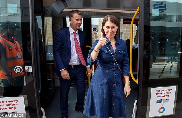 22251724-7793467-NSW_Premier_Gladys_Berejiklian_and_Transport_Minister_Andrew_Con-a-7_1576372601985.jpg,0