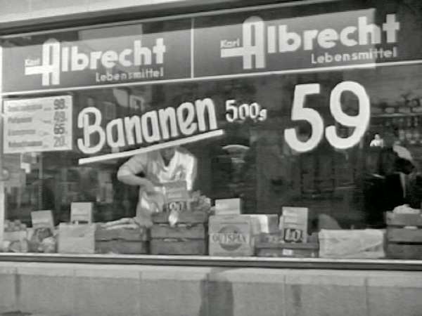 An old black and white photograph of a grocery store