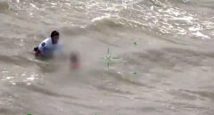 奥克兰警员从海水里救出男童 直升机拍下全过程
