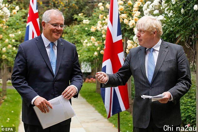 British Prime Minister Boris Johnson (R) and Australian Prime Minister Scott Morrison (L) announced the deal in the garden of number 10 Downing Street