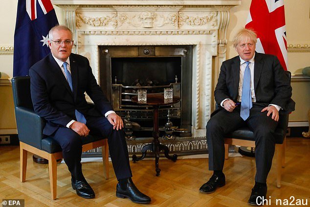 Scott Morrison and Boris Johnson (pictured together in London) announced the free trade deal on Tuesday