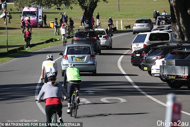 Locals described the scenes as 'chaos' with not even a single parking spot to be found in the massive parkland area. Centennial Park is a favourite for bicyclists, seen here