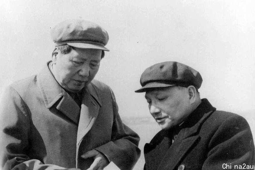 Black and white photo of Chairman Mao Zedong and Deng Xiaoping from 1959.