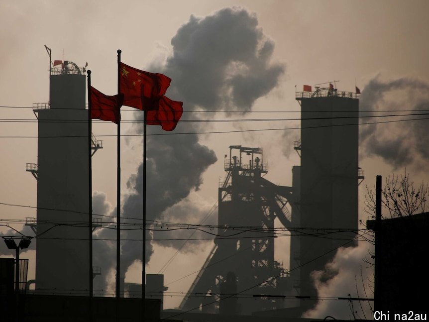 Chinese national flags are flying near a steel factory in Wu'an, Hebei province, China,