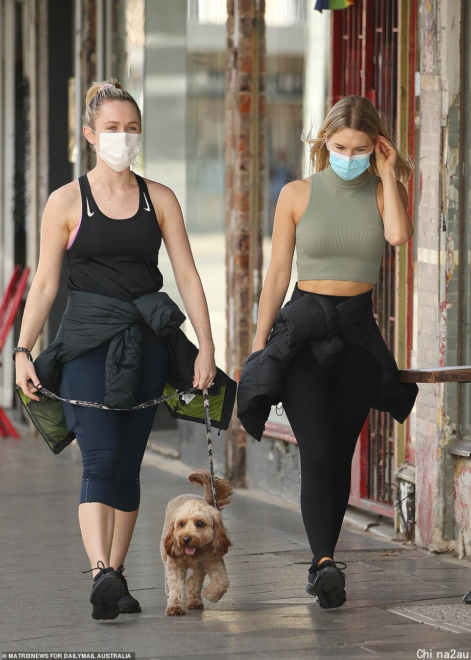 Sydneysiders out for their exercise in Newtown (pictured) were stunned by the show of force with officers stationed on the street and stopping traffic on one of the major roads into the city