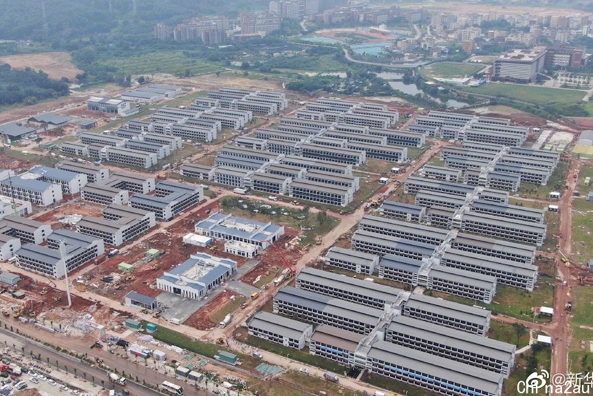 an aerial shot of a largte contruction site in China.