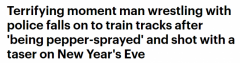 悉尼男子拒捕被喷辣椒水，受电击后踉跄跌入铁