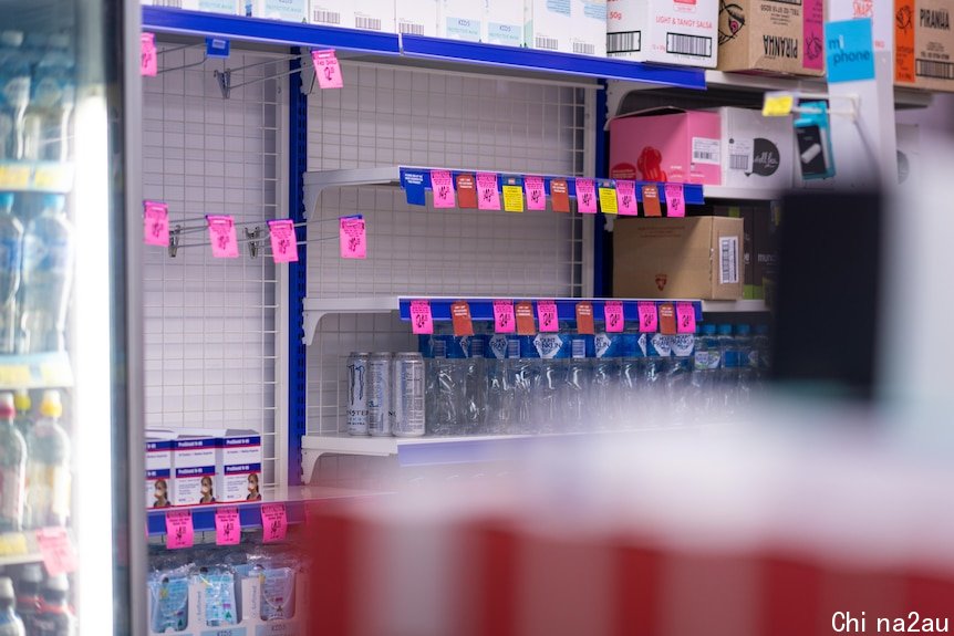 A picture of empty shelves where RAT kits were.