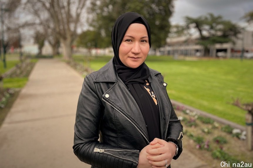 Woman stand in a park