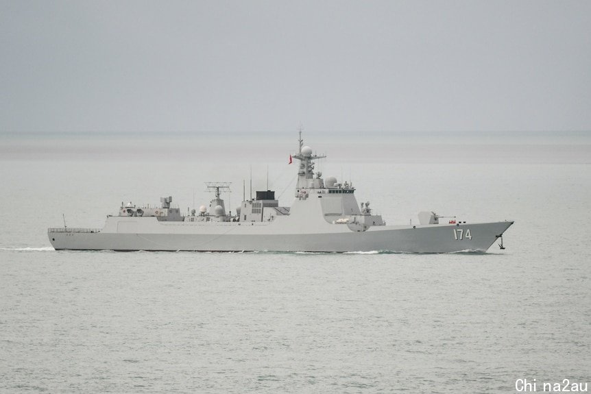 A chinese navy ship in the ocean.