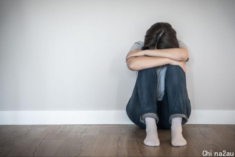 female-sexual-abuse-victim-sitting-in-gray-hallway-1024x683.jpg,0