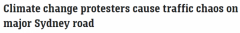 悉尼一地早高峰交通受阻！气候抗议者坐地示威