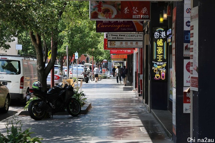 A street with many Chinese restaurants.