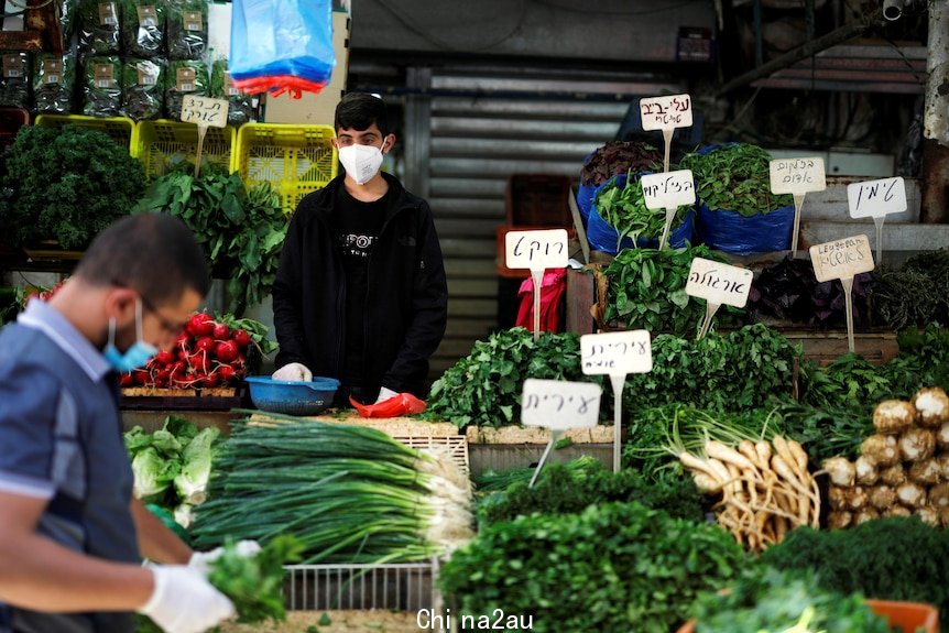 Shoppers at a Tel Aviv market