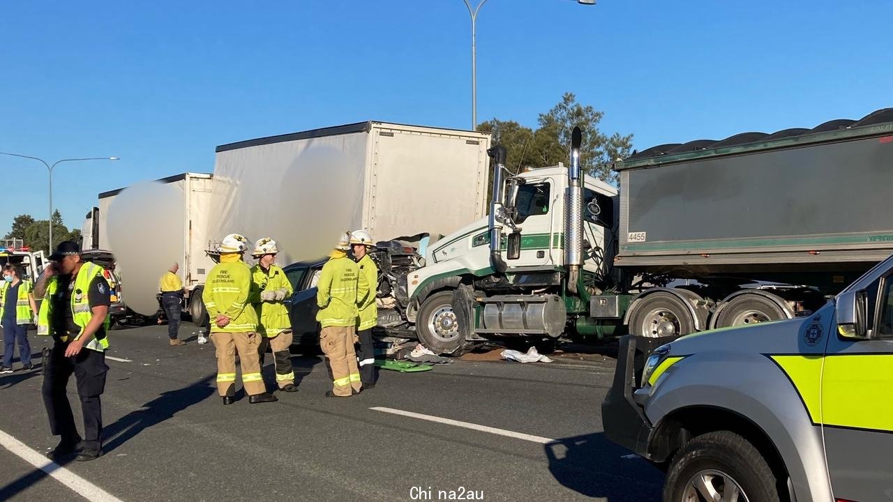 The scene of the truck v car smash on the Logan Motorway. Photo: QAS