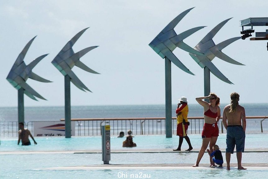 People at the lagoon on the esplanade in Cairns in far north in 2004.