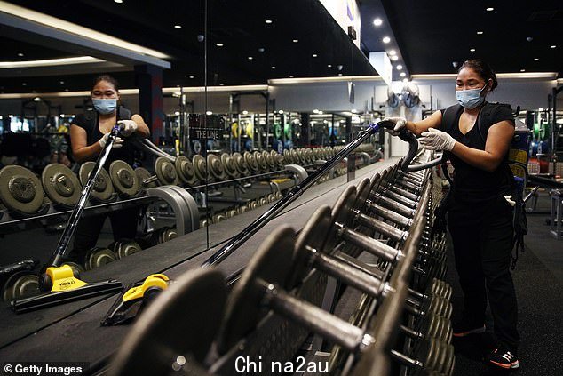 A cleaner is seen vacuuming at City Gym in East Sydney. Cleaners are seeing their salaries soar