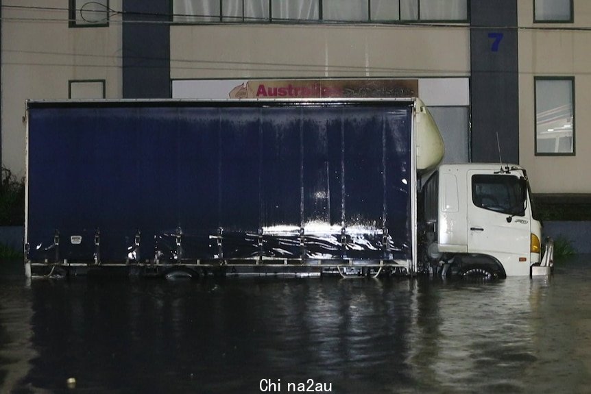 A truck parked in water