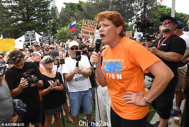 Ms Hanson speaks at a protest against the Queensland Government's vaccine mandate laws with one academic claiming the competition for populist votes hurt One Nation's poll showing