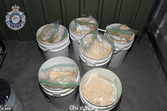 During a raid of the group's custom 'cocaine factory' they found plastic buckets containing cocaine hidden in an unknown substance (above)