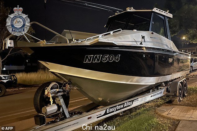 Police seized a 7.8.m boat (above) they believe was used to collect ocean drug drops from a 33-year-old Darwin man's home