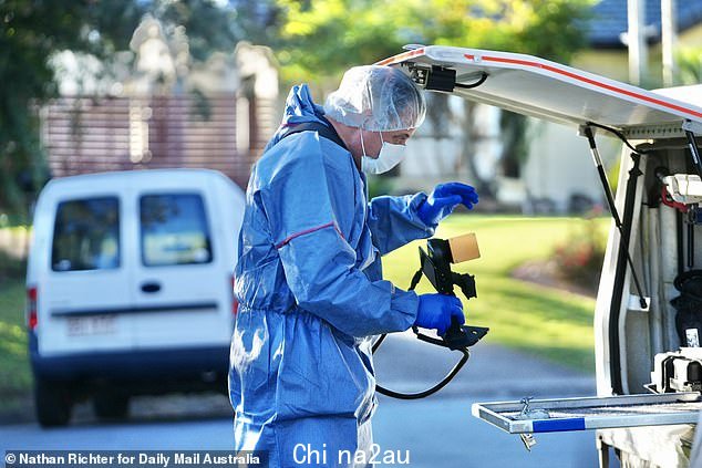 Forensic officers returned to the home on Tuesday morning and were seen taking photos and marking various spots around the property (pictured)