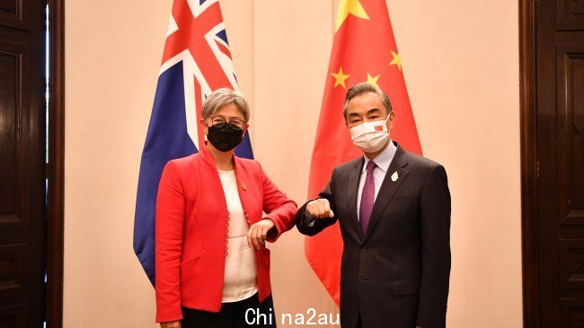 Chinese State Councilor and Foreign Minister Wang Yi with Australian counterpart Penny Wong. Picture: Xu Qin/Xinhua via Getty Images