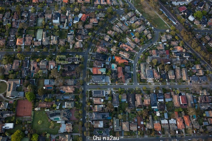 A view straight down on suburbia, from a hot air balloon.