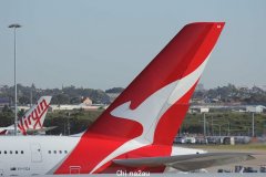 学校假期航空公司又迎来旅客高峰，航班延误和赔偿问题再度成为焦点（图）