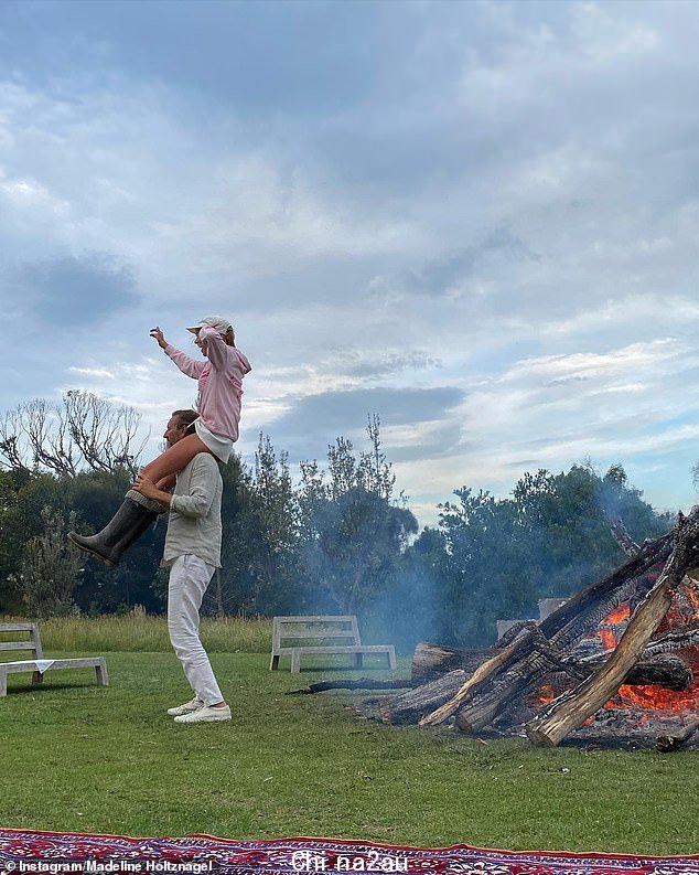 The Aussie model shared a selection of nine images to Instagram showing the couple's exotic adventures across the world, which included days at the beach, sleeping on a private jet and camping in the woods
