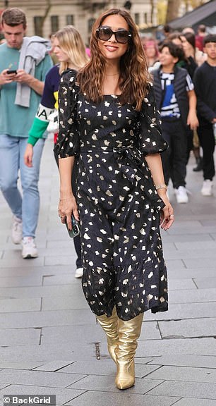 Divine: Myleene 在去广播工作室的路上被爸爸高兴地拍了下来