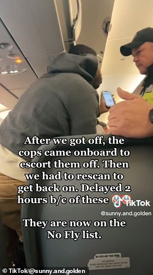 视频显示两人在面对航空公司工作人员时拒绝离开