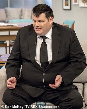 Before: Mark is pictured in 2017 before his weight
