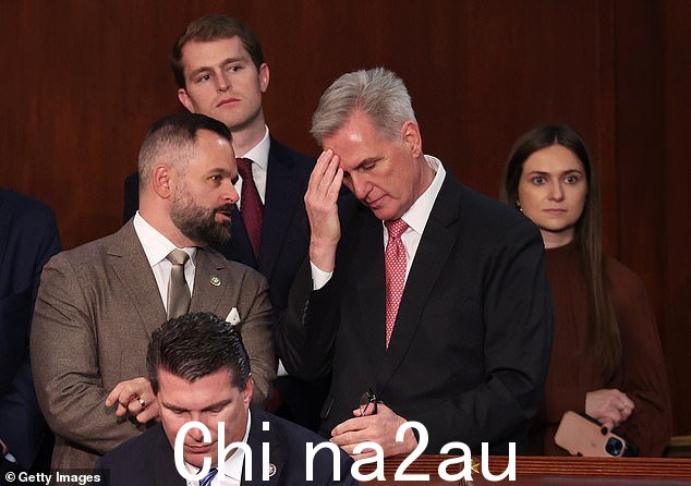 McCarthy spent much of the third day of votes walking around the chamber speaking to both allies and holdouts (seen speaking with Republican Rep.-elect Cory Mills of Florida)