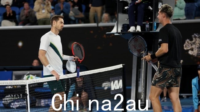 Andy穆雷和科基纳基斯赛后亲切握手,胜负有度。图片:Clive Brunskill/Getty Images