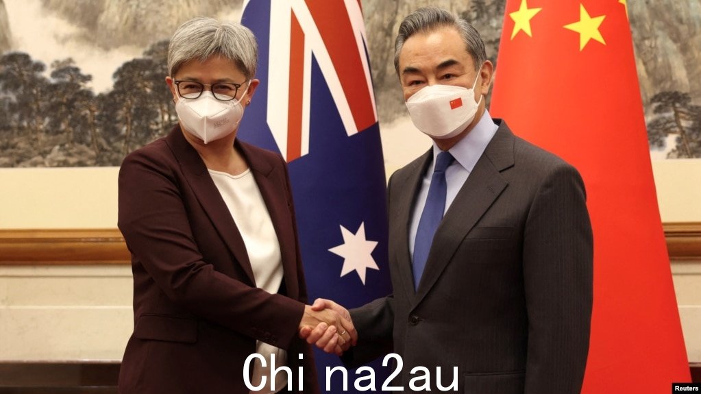 澳大利亚外交部长黄英贤于 2022 年 12 月 21 日在北京会见中国外交部长王毅。（路透社转发）