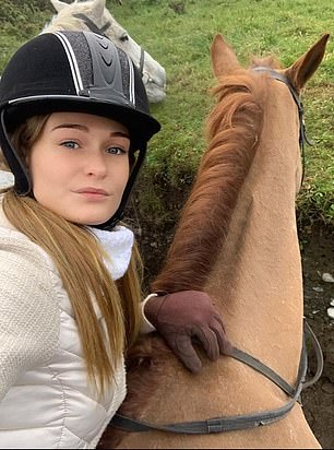Honour posing with her horse Cherry