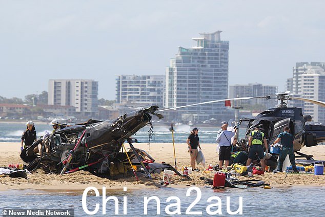 直升机在 1 月 2 日坠落到黄金海岸的沙洲之前与另一架半空中相撞