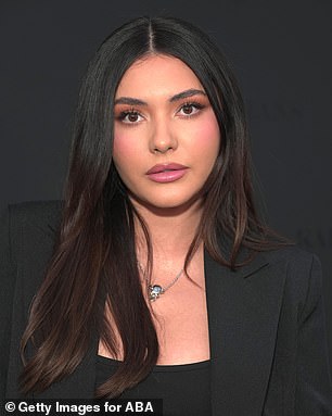Raven tresses: Atiana is pictured in April 2022 as a brunette