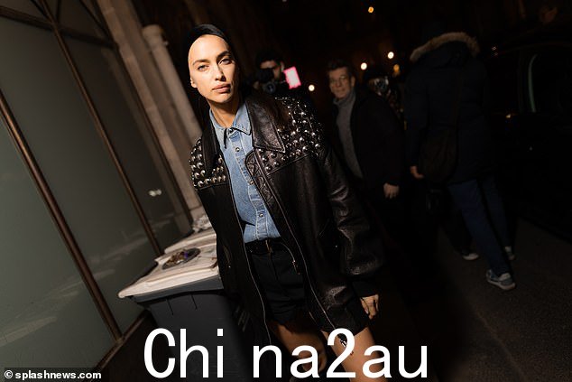 Style: Irina 搭配超大号黑色铆钉皮夹克和黑色及膝靴
