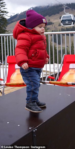 Loving it: Little Leo appeared in his element as he takes in the snowing roundings
