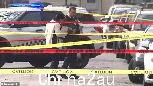 周一下午,警察在芝加哥贝尔蒙特克拉金街区的枪击现场