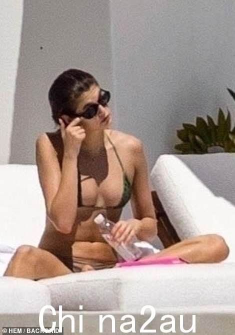 Sunbathing: The couple, who first began dating in late December 2021 on the heels of her split from Euphoria's Jacob Elordi, made the most of their time in paradise together by catching up on some rest and relaxation at their resort