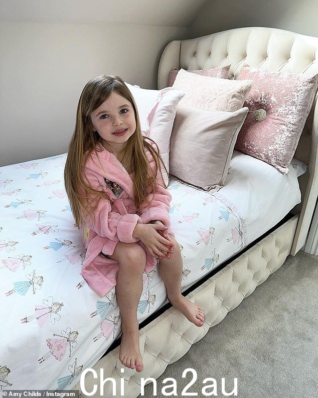 Happy: Polly looks delighted with her bedroom in her mum's trendy pad