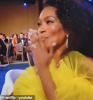认可印章:Ariana 在她臭名昭著的 BAFTA 包装中指的是令人困惑的歌词“Angela Basset 做了这件事”,她在 SAG 颁奖典礼上的厚颜无耻的笑话赢得了明星本人的认可