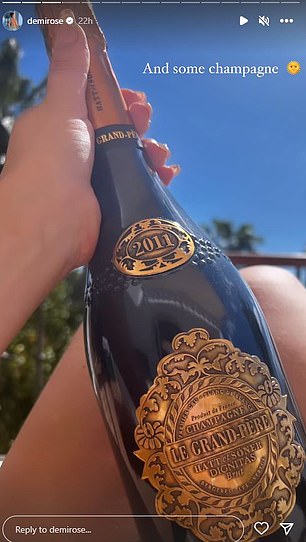 Bubbly!她正在爆香槟瓶,包括一瓶 Laurent-Perrier 和 Le Grand-Pere 香槟