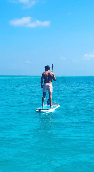Greg paddleboards