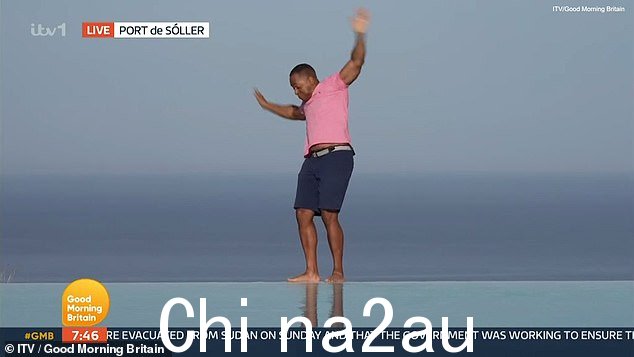 千钧一发:Andi Peters 在周一的《早安英国》分期节目中从马略卡岛进行现场直播时差点从无边泳池边上掉下来