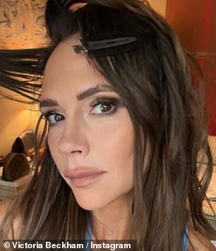 Glam:Victoria is pictured with makeup on