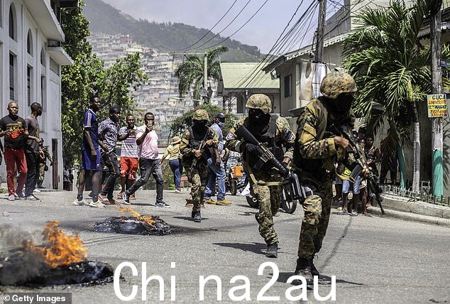 这个拉丁美洲最贫穷的国家在其总统约韦内尔·莫伊兹 (Jovenel Moïse) 去年被暗杀后陷入了新一轮的流血和混乱。图为:2021 年 7 月的抗议活动